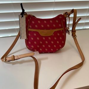 Never used Dooney & Bourke Crossbody bag! Dust bag and proof of registration
